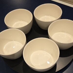 Elegant White Ceramic Bowl Set. Black Turn Base.